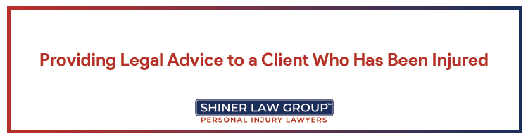 A professional West Palm Beach personal injury lawyer providing legal advice to a client who has been injured in a car accident.